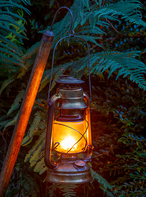 Hurricane lanterns are ideal for lighting. The Steam Tent Co-operative. © Gary Waidson - www.Steamtent.uk